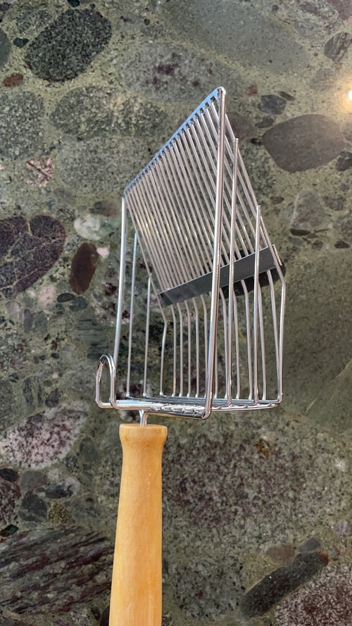 Metal litter scoop side angle, wooden handle